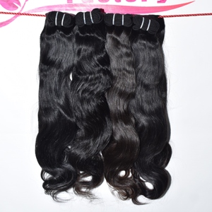 Extensions de cheveux naturels indiens non traités de qualité supérieure, ondulés, Remy, disponibles à la vente en gros - Product Image 3