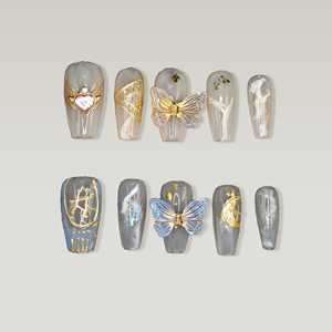 Faux ongles papillon fantaisie : ajoutez un style unique à vos doigts avec un design papillon chic - Product Image 1