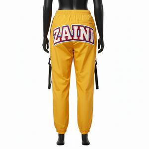 Pantalones Cortavientos para Mujer, Premium, Ligeros, 120 GSM, Tela de Nailon y Poliéster, Color Amarillo, Logotipo Bordado Personalizado - Product Image 2