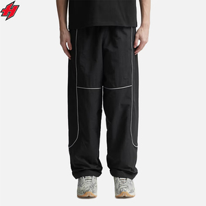 Pantalon en nylon Pantalon coupe-vent brodé à jambes larges Pantalon de survêtement en nylon décontracté pour homme en polyester pour homme - Product Image 1