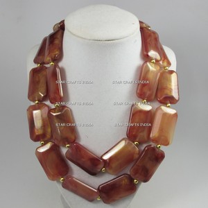 <span class=keywords><strong>Collana</strong></span> di <span class=keywords><strong>dentizione</strong></span> con pietre preziose di agata rossa <span class=keywords><strong>ambra</strong></span> barocca verde grezza più venduta <span class=keywords><strong>collana</strong></span> di perline di <span class=keywords><strong>ambra</strong></span> baltica curativa