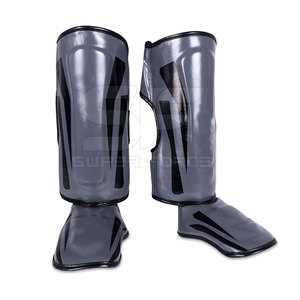 Protège-tibias de boxe en PU avec construction durable pour l'entraînement et les arts martiaux Protège-tibias de boxe à doublure souple - Product Image 1