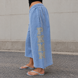 Pantalones cortos de chándal largos para hombre, personalizados, holgados, de punto, transpirables, de pierna ancha, con bajo sin rematar, estampado de letras, cintura elástica, estilo urbano, OEM - Product Image 1
