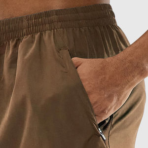 2025 Shorts de course décontractés pour hommes Logo personnalisé Shorts de sport motif solide élastique taille moyenne en gros teint uni écologique - Product Image 4