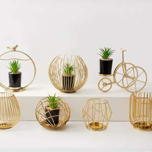 Maceta decorativa redonda de metal con patrones artísticos únicos, perfecta para la decoración del jardín del hogar y el estilo de eventos - Product Image 5