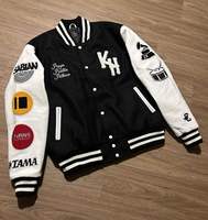 Veste universitaire grecque sur mesure en gros, veste de style baseball universitaire noire et blanche avec des patchs en chenille