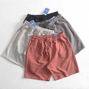 Short en jean pour homme OEM ODM personnalisé déchiré bord brut usine marque privée vente en gros streetwear décontracté vêtements de mode d'été - Product Image 1