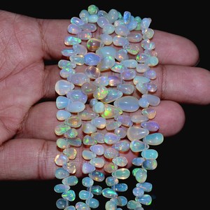 โอปอลเอธิโอเปียธรรมชาติทรงหยดน้ำขนาด 6x4 มม.-10x6 มม. เกรด AAA+ แบบเรียบเนียน สำหรับทำเครื่องประดับ - Product Image 3