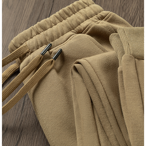 กางเกงกีฬาผู้ชายทรงหลวม สไตล์เรโทร สีพื้น เรียบง่าย สวมใส่สบาย เหมาะกับฤดูใบไม้ร่วง - Product Image 5