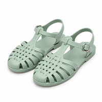Sandales plates pour femmes, tendance, d'extérieur, polyvalentes, à bout fermé, style romain, à semelle simple, décontractées, pour la plage, en gelée, à boucle, couleur unie