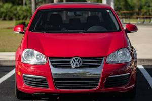 รถยนต์โฟล์คสวาเกน เจตต้า ทีดีไอ รุ่นคัพ อิดิชั่น ปี 2010 แบบซีดาน เครื่องยนต์ดีเซล ประหยัดน้ำมัน แรงบันดาลใจจากรถแข่ง ดีไซน์ทันสมัย ขาย - Product Image 3