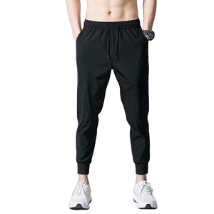 Nouveau logo personnalisé pantalons de survêtement empilés pour hommes pantalons High Street Fashion séchage rapide coupe ample mi-taille Joggers joggeurs unisexes - Product Image 1