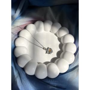 Collana in acciaio con figure a cuore in pietra trasparente Color argento