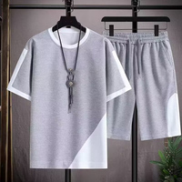 Ensemble de sport d'été pour homme, personnalisé OEM avec logo sérigraphié, T-shirt à manches courtes et pantalon en tissu gaufré, coupe ample, respirant