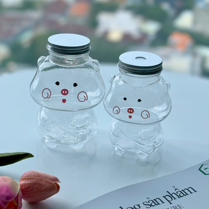 Bouteille en plastique PET en forme de cochon avec bouchon en aluminium pour boissons de plusieurs tailles (Logo personnalisé/Design graphique) Vietnam Factory - Product Image 1