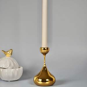 Dual tone metal <b>candle</b> holder blending copper and <b>black</b> finishes for contemporary contrast in eclectic home settings - Product Image 2