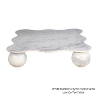 Table basse sculpturale moderne en marbre naturel ORRIS LIVING, plateau artistique, base de luxe, mobilier de salon