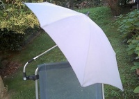100% Parasol asymétrique de fabrication italienne Manteau de couleur unie à haute protection anti UV avec pince brevetée x poussettes et fauteuil roulant