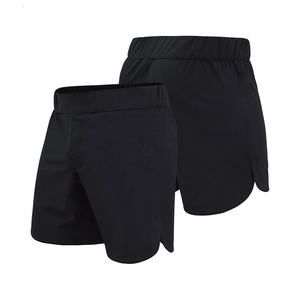 Shorts MMA noirs personnalisés en gros, confortables, à coupe latérale, taille élastique, respirants, séchage rapide, vêtements professionnels d'arts martiaux - Product Image 1