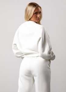 Conjunto de dos piezas para correr con bolsillos laterales y pantalones de chándal con puños elásticos y manga raglán de forro polar de ajuste relajado para mujer con logotipo personalizado - Product Image 5