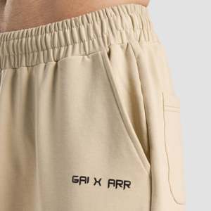กางเกงวอร์มสีเบจทรงหลวม GAI X ARR ผ้าฝ้าย 100% เอวยางยืด ปรับแต่งโลโก้ได้ สไตล์ลำลองสมาร์ท พร้อมจีบ ไซส์ XL - Product Image 5