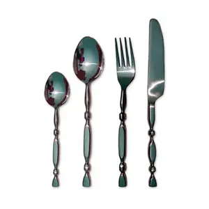 Elegante juego de cubiertos de acero inoxidable de color plateado con espejo pulido perfecto para Bodas de comedor en casa y ocasiones especiales - Product Image 1