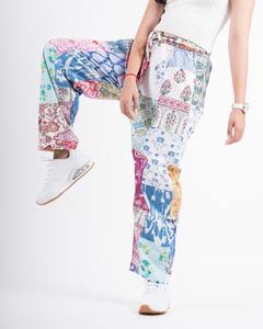 Vente en gros de pantalons harem patchwork toutes saisons avec taille élastique vêtements de festival d'été pour femmes et hommes avec poches - Product Image 1