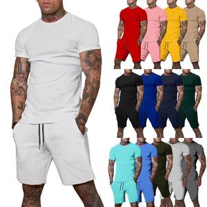 Ensemble de vêtements de jogging en coton deux pièces d'été personnalisés en usine pour hommes T-shirt et short avec logo uni survêtement de sport - Product Image 1