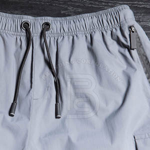 Pantalones rectos informales de estilo callejero para hombre, cintura alta, opciones de cintura media, tela de nailon de algodón negro, cierre de cordón OEM - Product Image 5