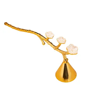 على شكل مخروط شمعة مطفية بمقبض أزهار هو إضافة مثالية لطاولة مجموعة إكسسوارات الشموع الخاصة بك