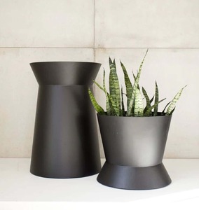 Customizable metal flower <b>pot</b> and planter with golden base and black top crafted for high contrast home decor aesthetics - Product Image 5