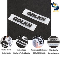 Étiquettes en caoutchouc PVC en gros, logo personnalisé 3D en relief, patchs en silicone souple semi-transparents pour vêtements