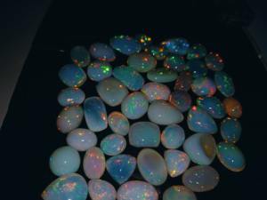 หินโอปอลเจียระไนทรงไข่สีขาวแบบหลายไฟโอปอลเจียระไนจากเอธิโอเปียธรรมชาติขนาดใหญ่เกรดสูง-หินคุณภาพสูงสำหรับการซื้อของคุณ - Product Image 6