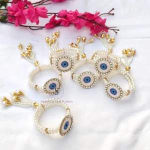 Hermosos diseños de Moti, brazaletes con patrón de mal de ojo, hermosa perla Kundan, trabajo étnico para boda y devolución, brazalete de hilo de recuerdo - Product Image 3