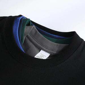 Camisetas de verano de alta calidad para hombre Camiseta de manga corta de algodón pesado con cuello cómodo de color blanco sólido Suelto - Product Image 3