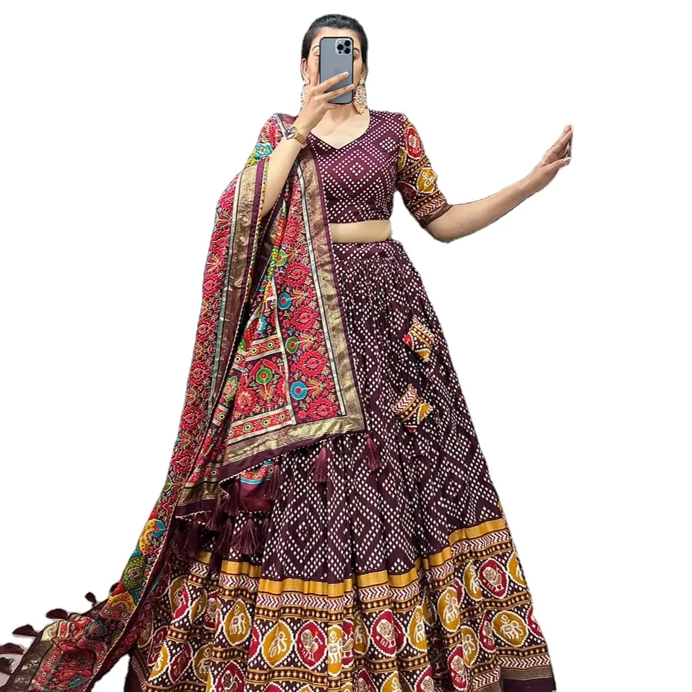 This beautifully printed lehengadesign going from a royal shade ensemble for function Casual Dresses