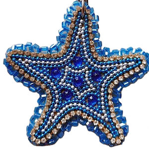 Beautiful star design <b>blue</b> and white coloured seed beaded embroidery keychain and keyring and <b>bag</b> accessories from India - Product Image 1