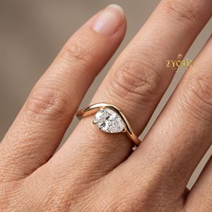 Anillo de compromiso con corte de pera en oro de 10K, anillo solitario contemporáneo de diseño llamativo - Product Image 6
