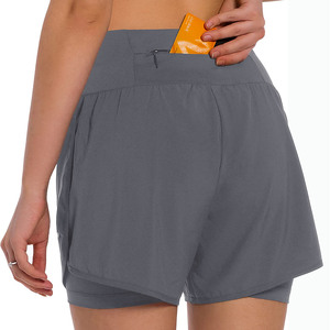 Short de yoga respirant et écologique en spandex/nylon pour femme, dos nu, motif à carreaux, anti-rides, extensible et à séchage rapide - Product Image 1