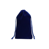 Petite pochette en velours bleu marine avec cordon de serrage pour le rangement de bijoux