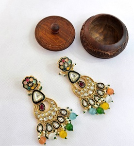 Festival Special Kundan <b>Jhumka</b> <b>Earrings</b> Handcrafted with Pearl Detailing and Gold Plated Finish Shop Latest Traditional Designs - Product Image 1