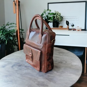 กระเป๋าเดินทางหนังแท้ทรงดัฟเฟิล สีน้ำตาล ขนาดใหญ่ สไตล์วินเทจ ยี่ห้อ Sitchic สำหรับทุกเพศ  แบบสปอร์ต  พร้อมสายรัดแบบ HOOK&LOOP  ขนาด 20-28 นิ้ว  ลาย Oil Pull - Product Image 5