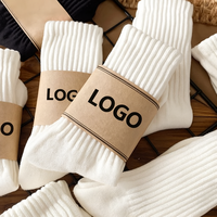 Chaussettes respirantes de couleur unie avec logo personnalisé pour hommes, confortables, chaudes et décontractées.