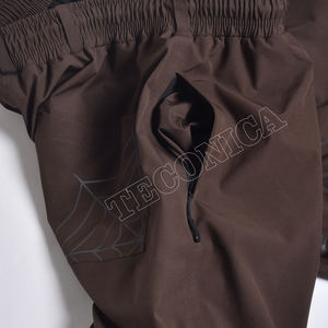 2025 ropa de esquí Unisex de alta calidad impermeable holgado cortavientos con forro polar cintura ajustable pantalones de esquí a prueba de viento cremallera OEM - Product Image 4