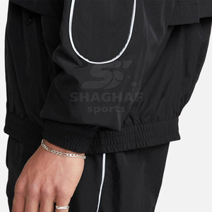 Ensemble coupe-vent deux pièces avec veste et pantalon pour un port facile en extérieur et au quotidien - Product Image 4