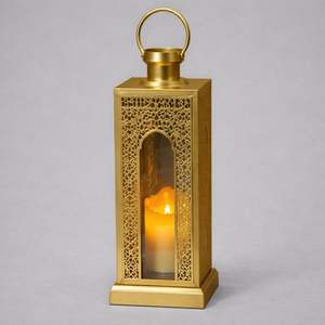 <b>Gold</b> Finish Metal Moroccan <b>Lantern</b> with Glass Panels Intricate Cutwork Warm Candle Glow for Festive Home Decor and Gifting - Product Image 4