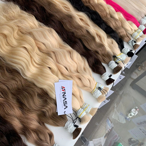 Extensiones de cabello a granel Producto de Venta caliente 2025 Color claro 50cm ondulado natural 100% cabello vietnamita de alta calidad - Product Image 1