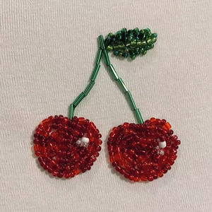 Bolso Bandolera Circular de Rafia Tejida a Crochet, Color Beige, Hecho a Mano, con Borla Boho y Llaveros Trenzados con Cuentas - Product Image 1