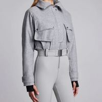 Combinaison de ski imperméable blanche pour femme avec fermeture éclair et taille cintrée, en nylon et spandex
