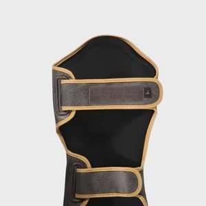 Protège-tibias Muay Thai Protège-tibias de boxe en cuir avec coutures renforcées et rembourrage haute densité Protection contre les chocs - Product Image 2